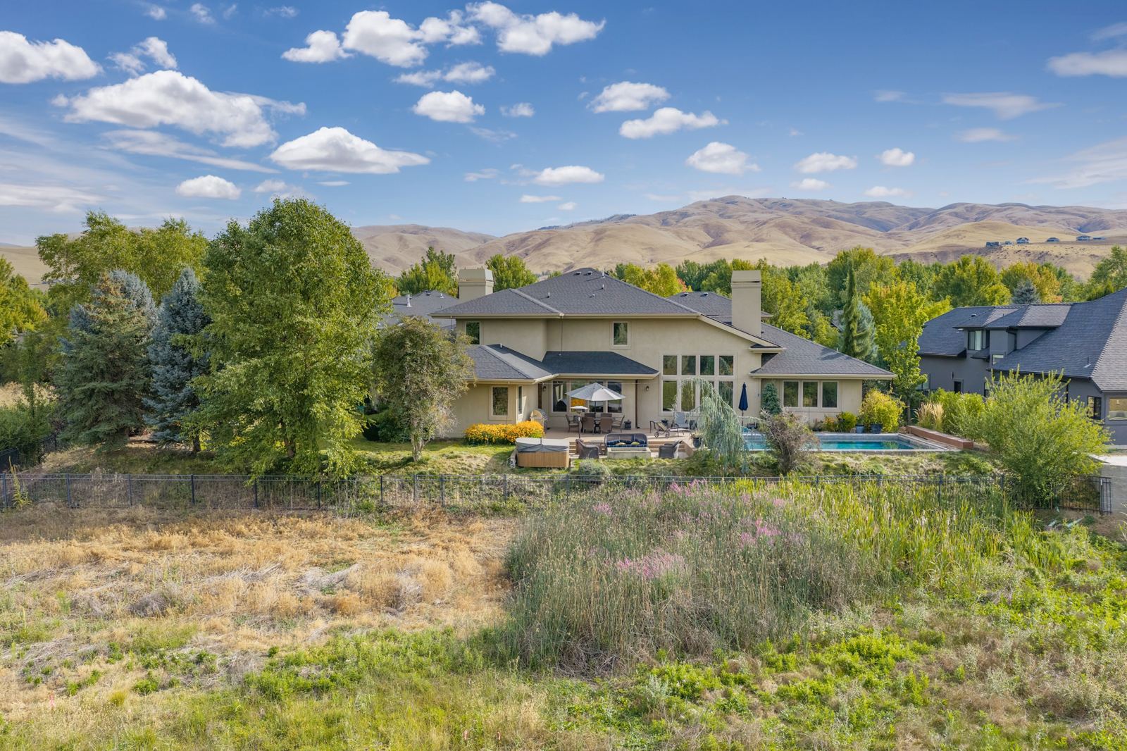 Boise home backing to open space with the foothills behind it
